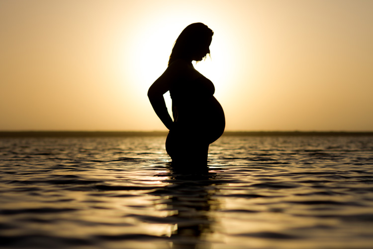 CAN YOU SURF WHILE PREGNANT: SAFE SURFING TIPS FOR EXPECTING MOTHERS