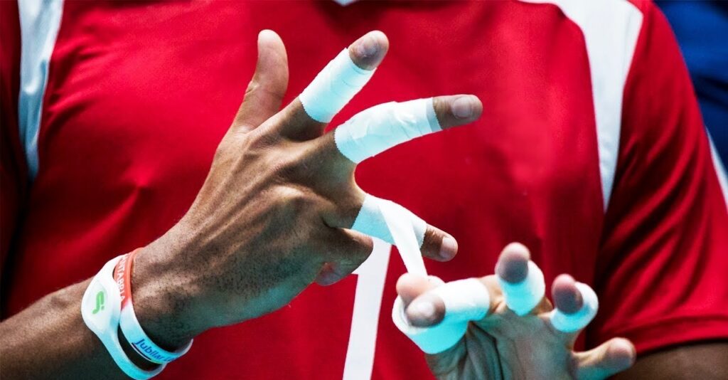 WHY DO VOLLEYBALL PLAYERS TAPE THEIR FINGERS: UNVEILING THE SECRETS